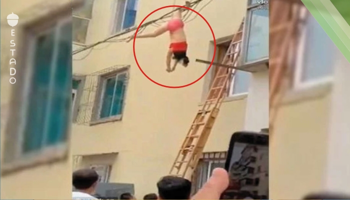 VÍDEO: Amante huye por la ventana  y queda colgada en los cables del edificio, pero eso no fue lo peor
